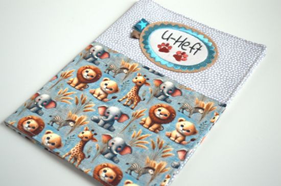 Bild von U-Heft Hülle Dschungel blau/beige