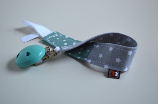 Bild von Schnullerband hellgrau/petrol Sternchen