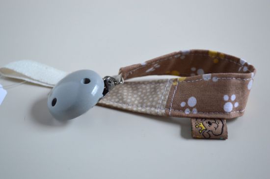 Bild von Schnullerband beige Pfötchen